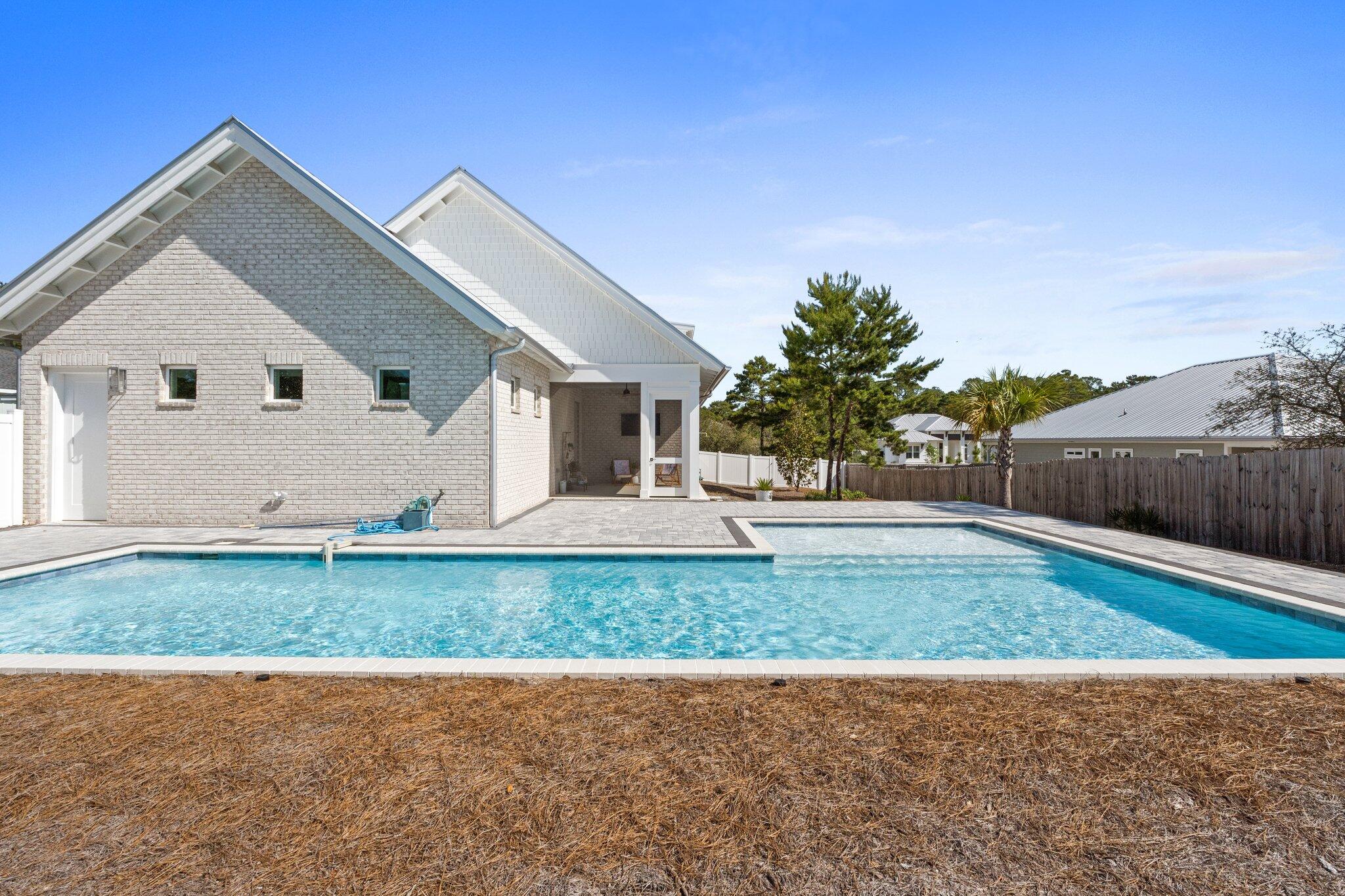 479 Ridge Road Santa Rosa Beach, FL 32459 - Photo 28 of 45 a view of a house with a yard