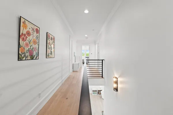a view of entryway with wooden floor