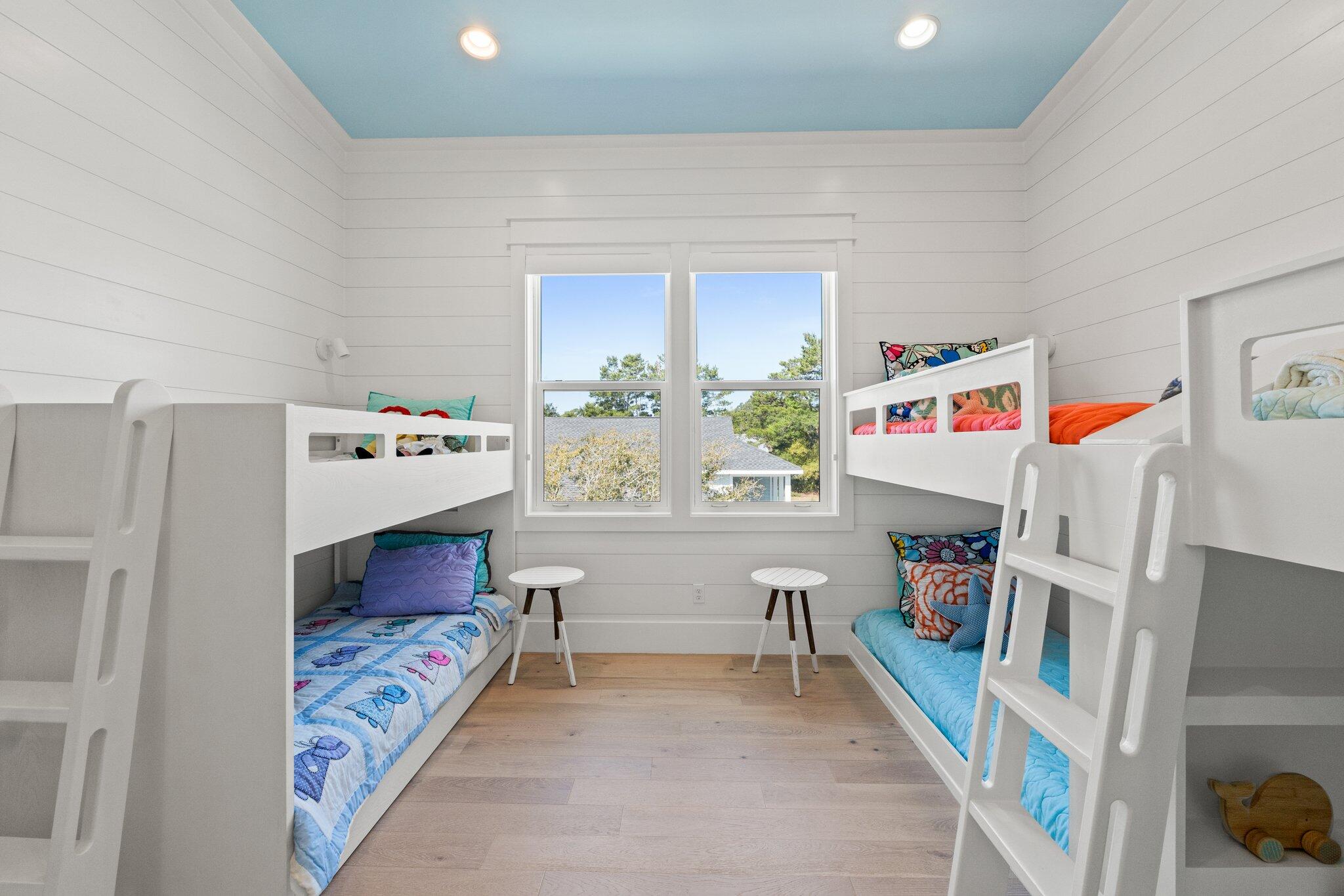 479 Ridge Road Santa Rosa Beach, FL 32459 - Photo 33 of 45 a bedroom with baby toys and a window