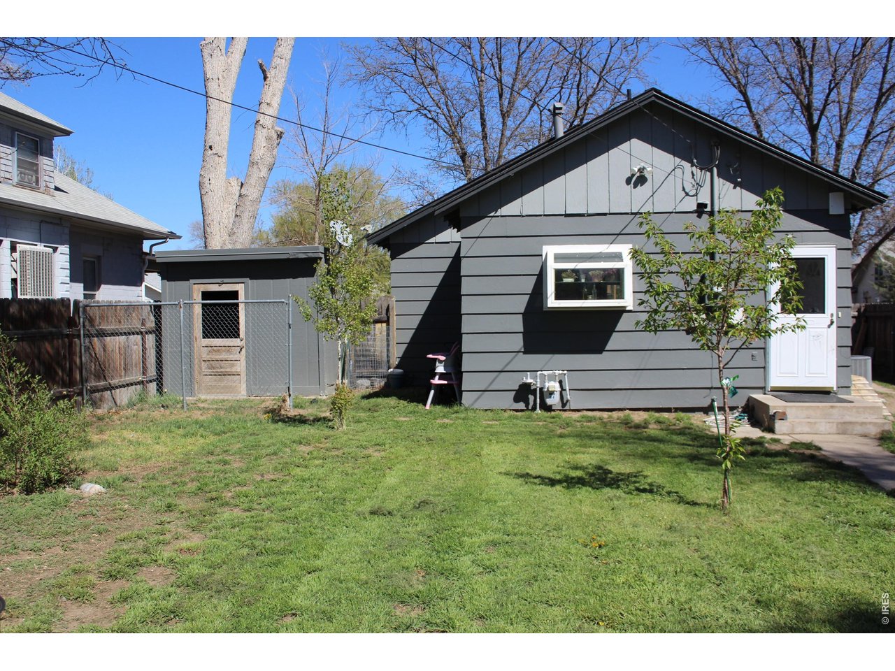 811 Prospect Street Fort Morgan, CO 80701 - Photo 17 of 19 a front view of a house with a yard