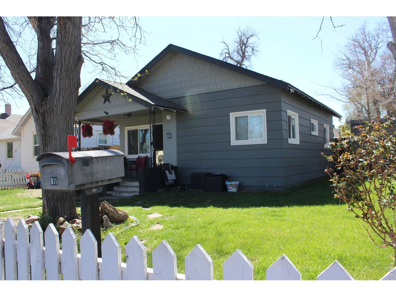 811 Prospect Street Fort Morgan, CO 80701 - Photo 3 of 19 a house view with a garden space