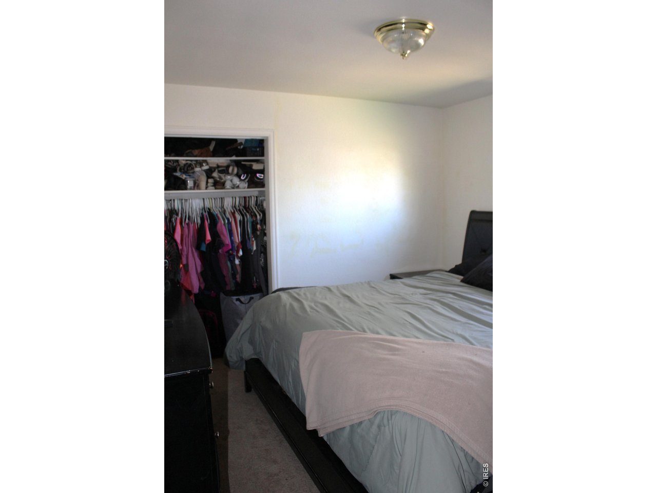 811 Prospect Street Fort Morgan, CO 80701 - Photo 9 of 19 a bed room with a bed