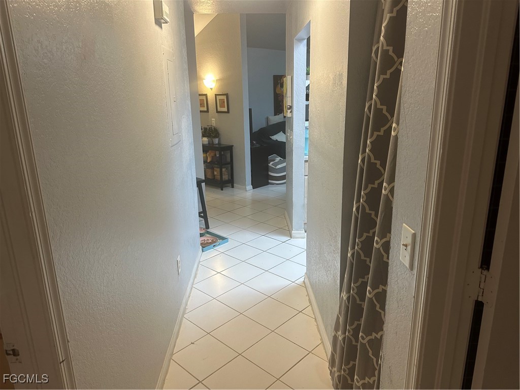 950 Moody Road, Unit 110 North Fort Myers, FL 33903 - Photo 28 of 32 a view of a bathroom from a corridor