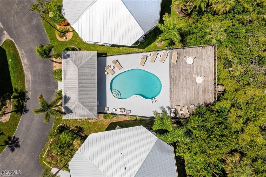 950 Moody Road, Unit 110 North Fort Myers, FL 33903 - Photo 32 of 32 a wooden fence with some potted plants