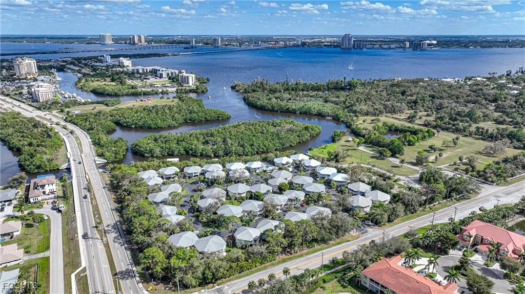 950 Moody Road, Unit 110 North Fort Myers, FL 33903 - Photo 7 of 32 an aerial view of a house with a garden and plants