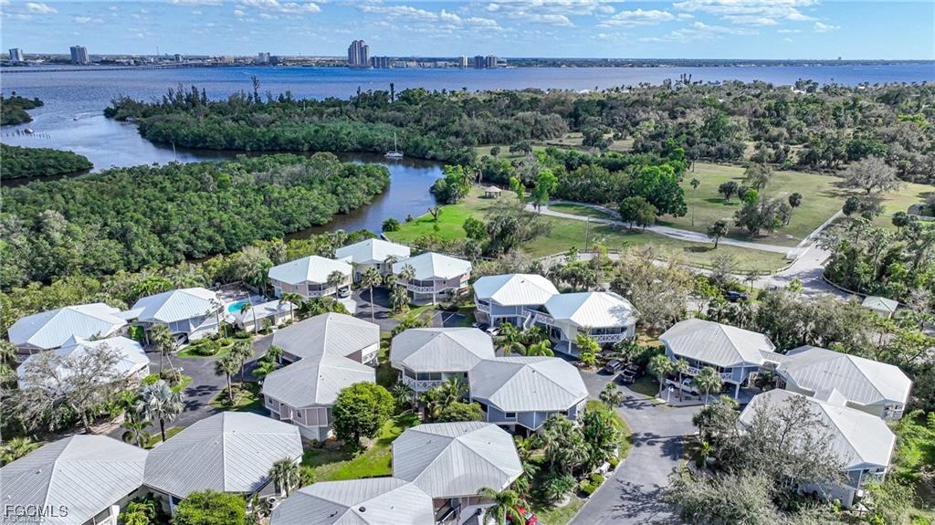 950 Moody Road, Unit 110 North Fort Myers, FL 33903 - Photo 8 of 32 an aerial view of a house with a yard