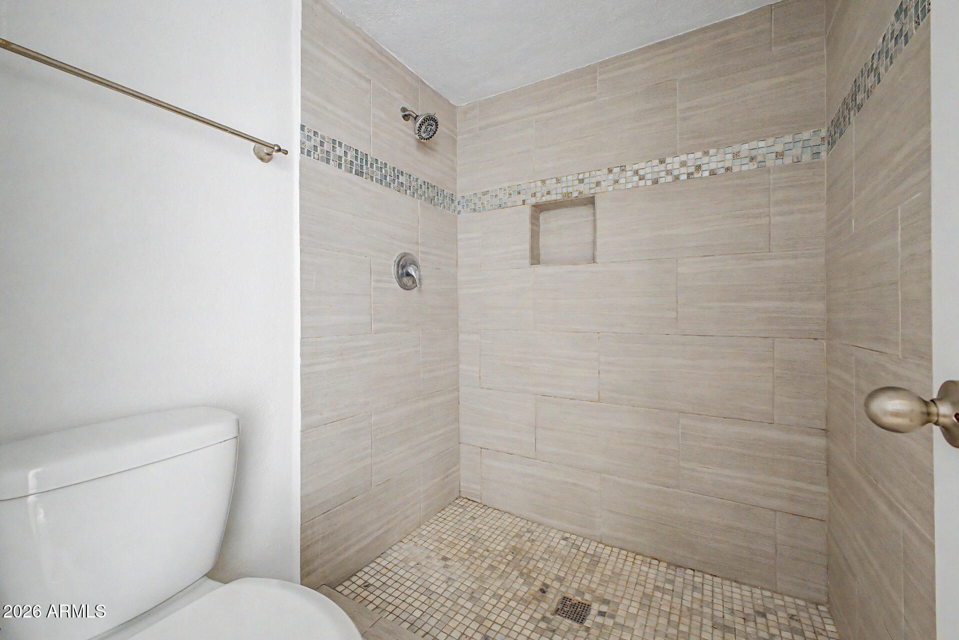 3422 North 12th Place Phoenix, AZ 85014 - Photo 22 of 49 a bathroom with a toilet and a shower