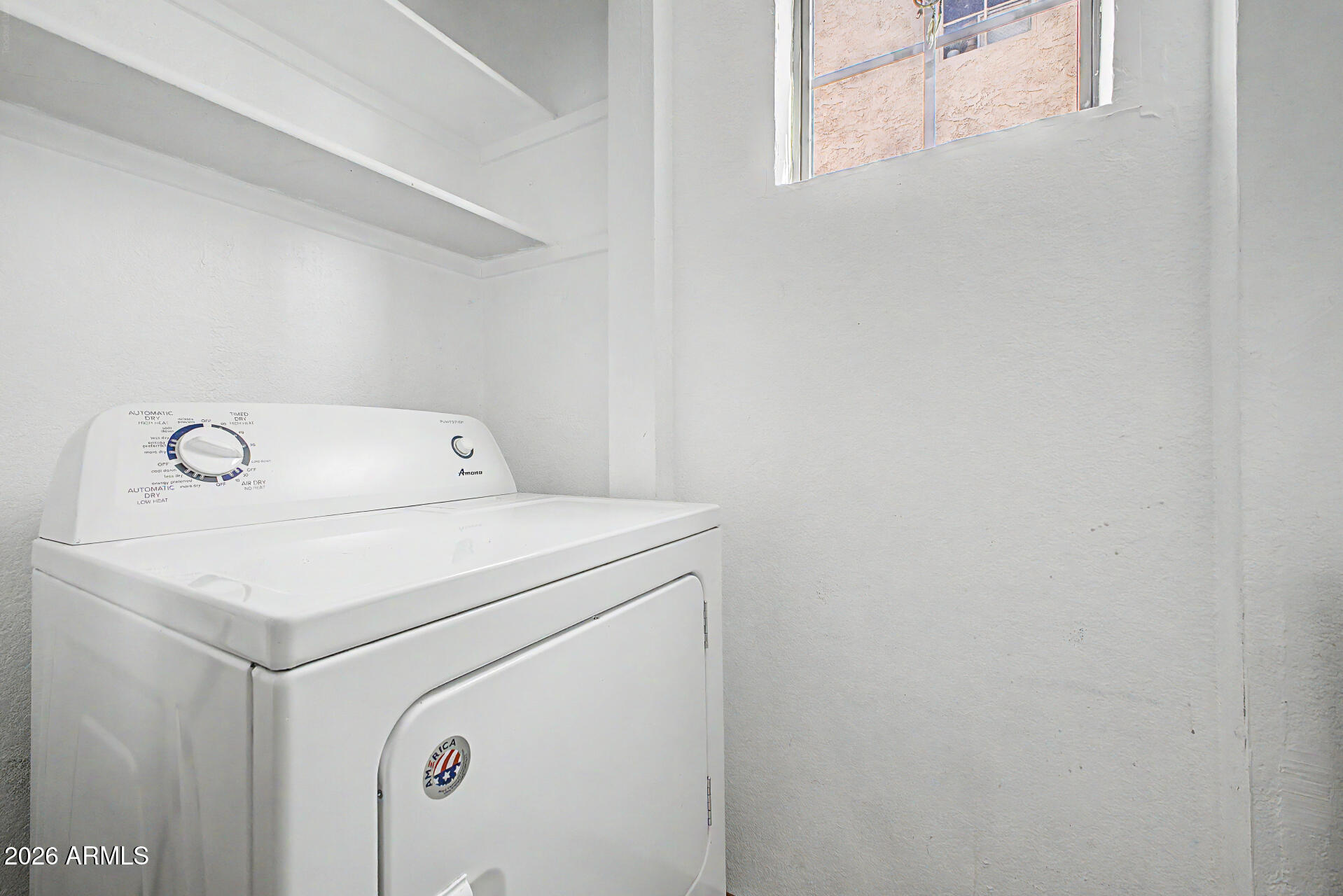 3422 North 12th Place Phoenix, AZ 85014 - Photo 23 of 49 a utility room with dryer and washer