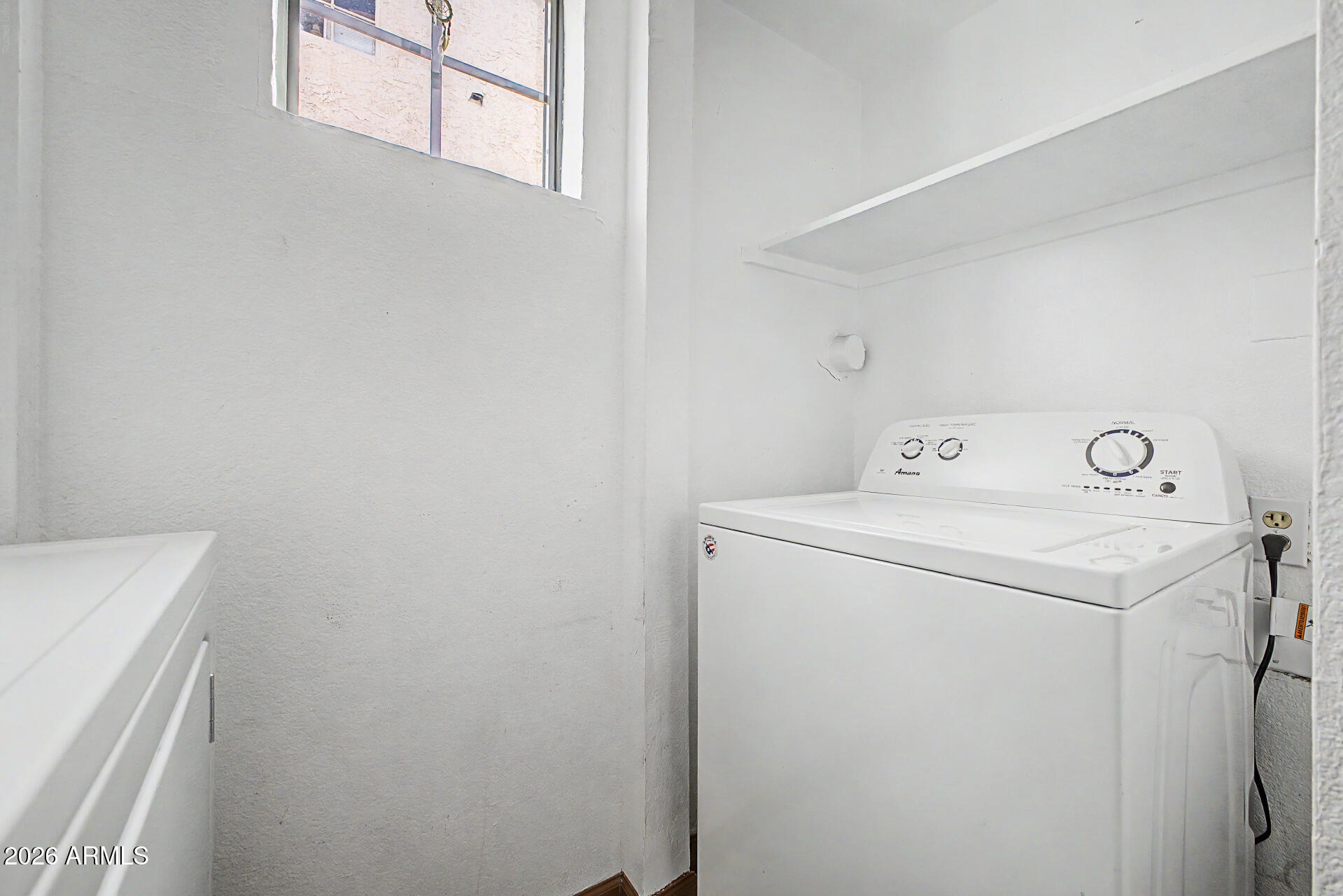 3422 North 12th Place Phoenix, AZ 85014 - Photo 24 of 49 a utility room with dryer and washer