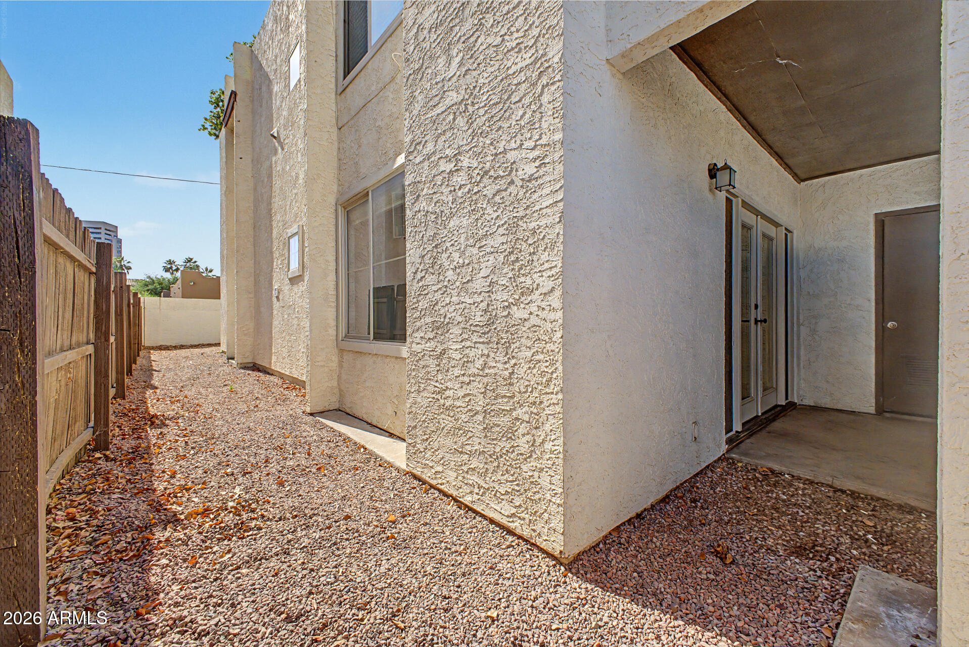 3422 North 12th Place Phoenix, AZ 85014 - Photo 28 of 49 a view of a back yard from a hallway