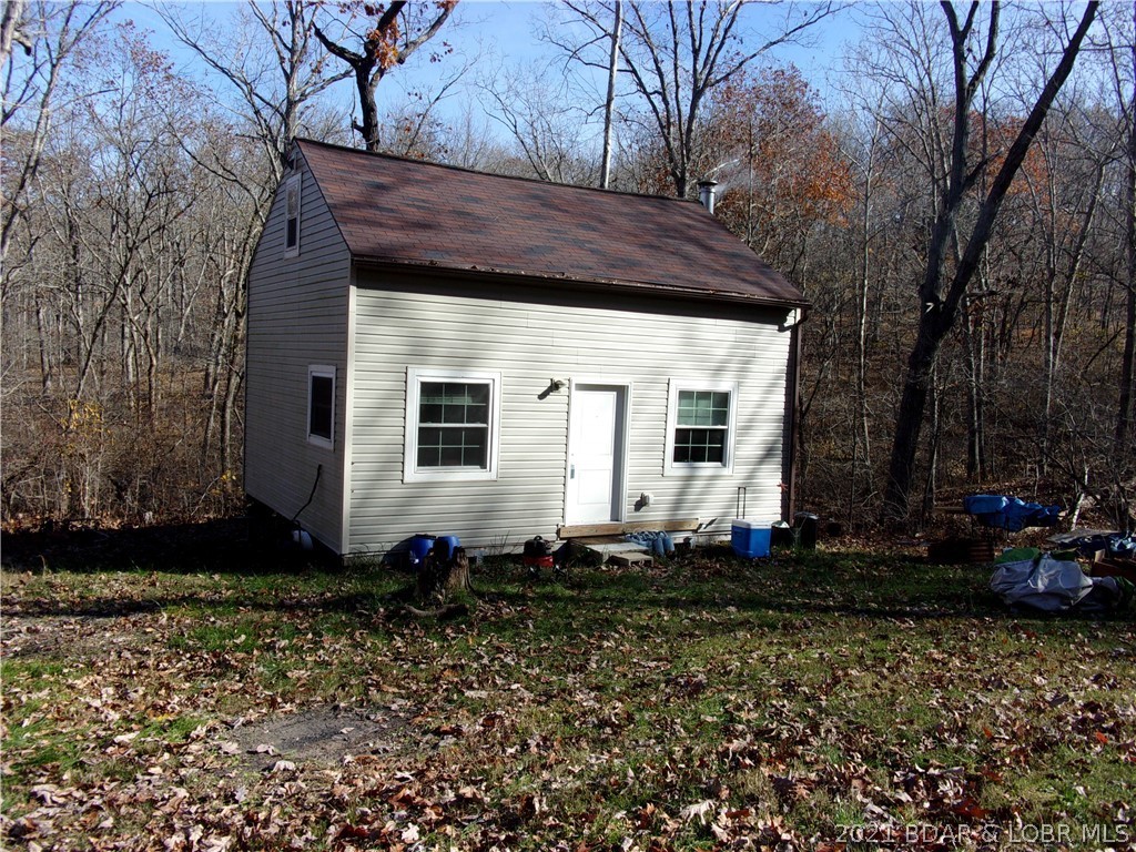 31025 Broken Circle Road Stover, MO 65078 - Photo 1 of 1 Front of cabin