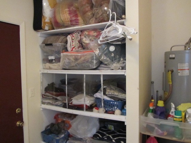 93 Deerfield Road Huntsville, TX 77340 - Photo 18 of 24 Storage area in utility room