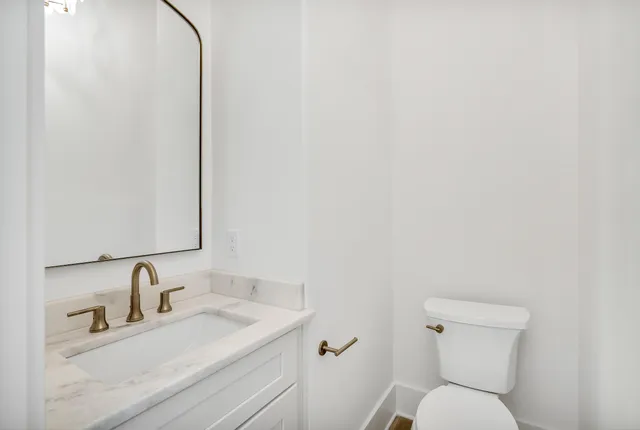 a view of a back yard of the house and green space