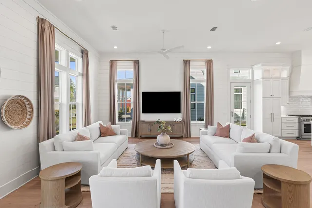 a bathroom with a sink toilet vanity and shower