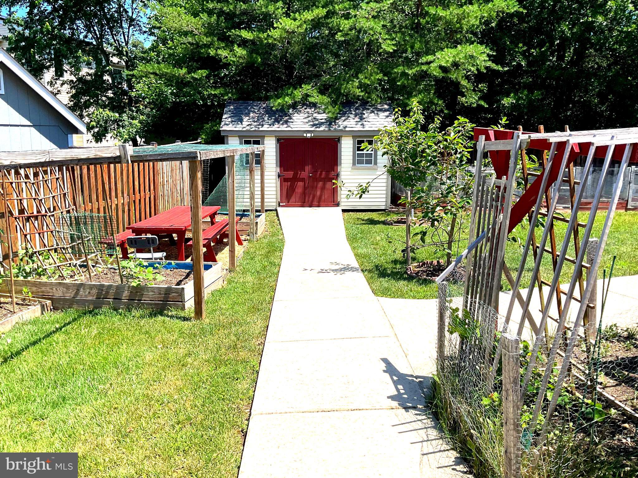601 Accoton Drive Accokeek, MD 20607 - Photo 11 of 82 Shed, Concrete Walkway, Planters