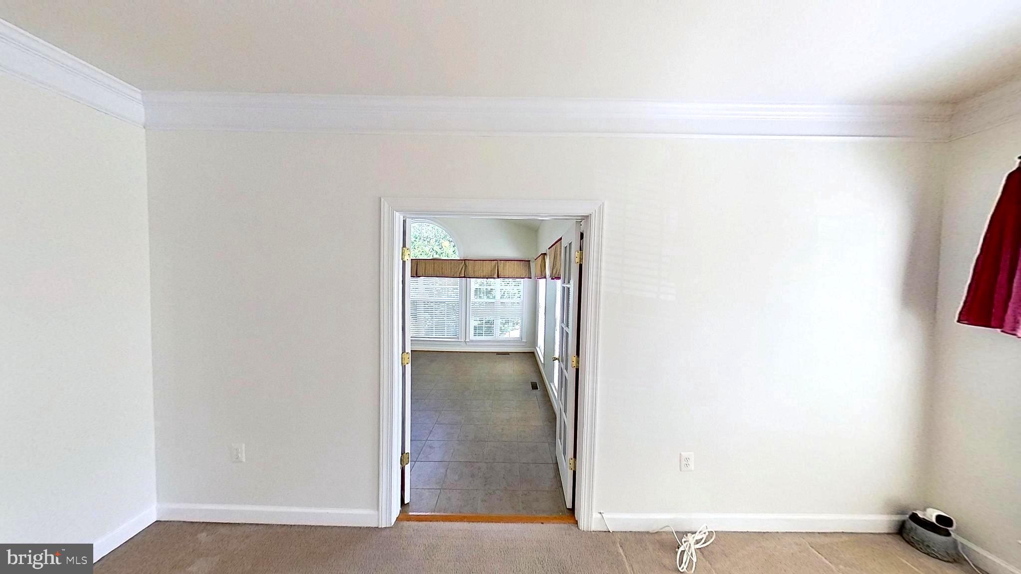 601 Accoton Drive Accokeek, MD 20607 - Photo 21 of 82 View from Living Room into Atrium/Sunroom