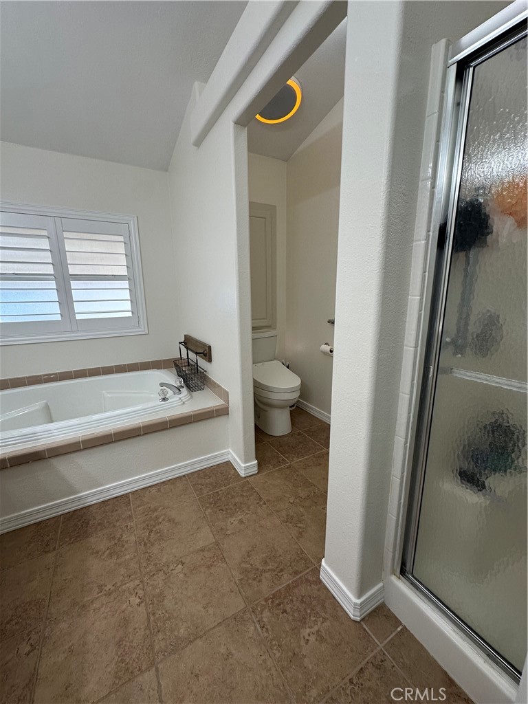 50761 Parker Dam Road, Unit 71 Big River, CA 92242 - Photo 7 of 23 a spacious bathroom with a granite countertop sink and a mirror