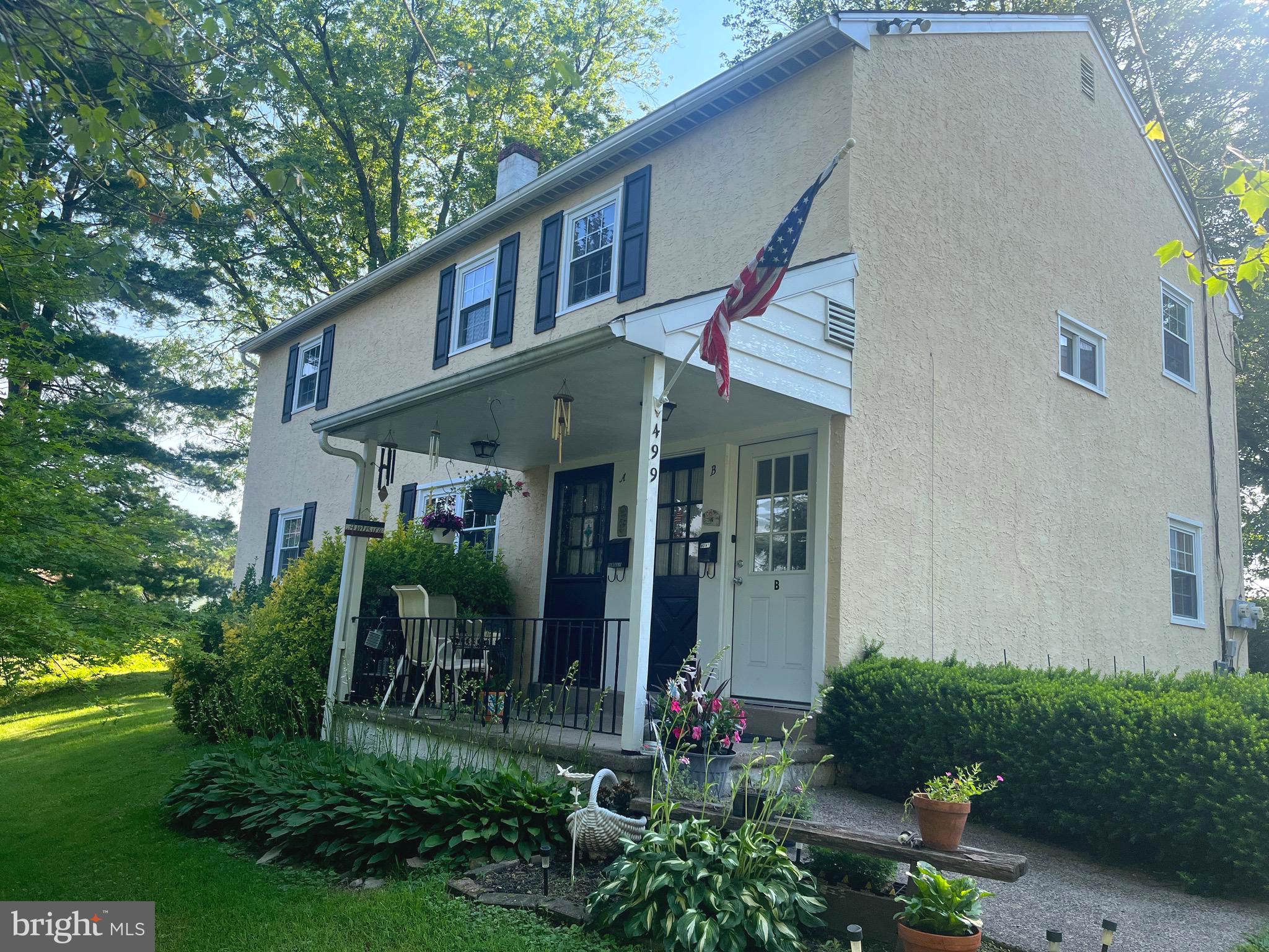 499 Prospect Road Warminster, PA 18974 - Photo 1 of 48 a front view of a house with garden