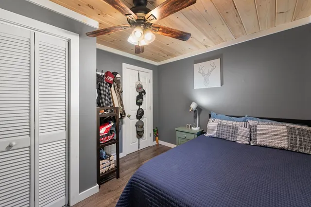 a view of a swimming pool with a yard