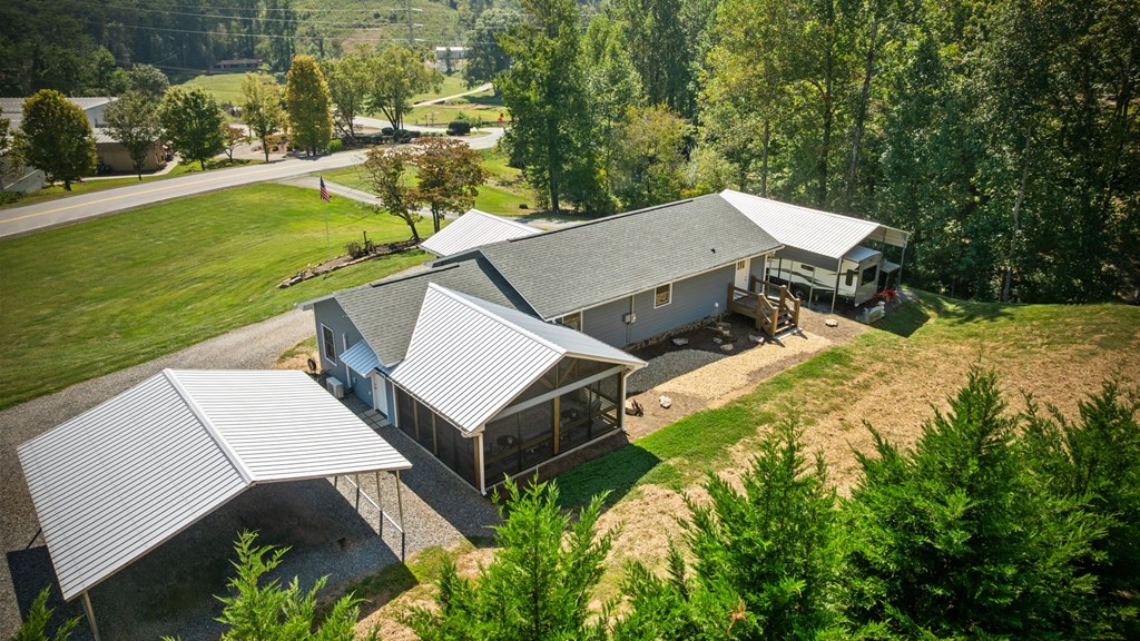 1201 Ada Street Blue Ridge, GA 30513 - Photo 49 of 62 an aerial view of a house with a garden