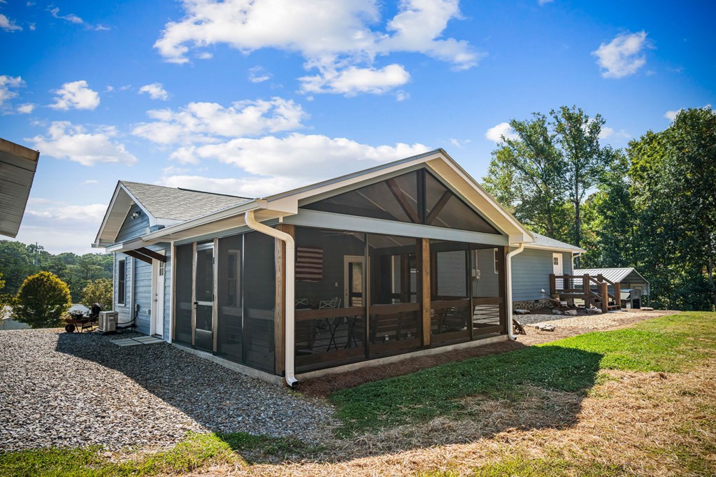 1201 Ada Street Blue Ridge, GA 30513 - Photo 59 of 62 a view of a house with a yard