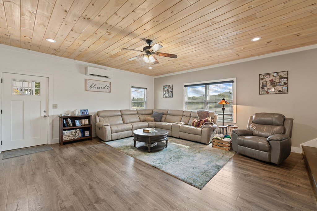 1201 Ada Street Blue Ridge, GA 30513 - Photo 9 of 62 a living room with furniture and wooden floor