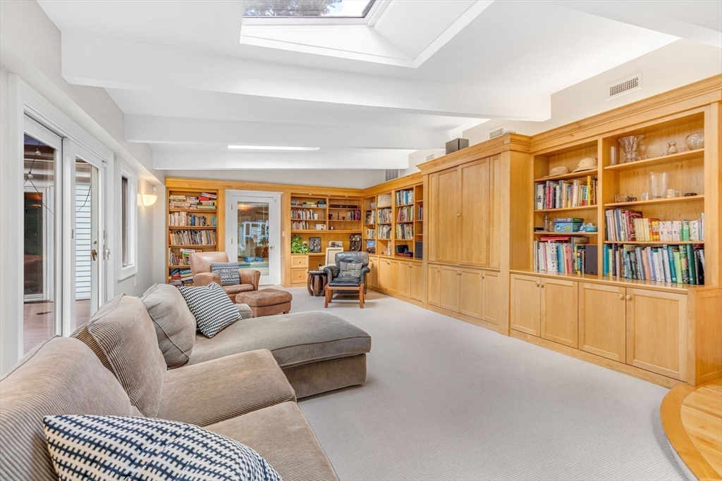 46 Round Hill Road Lincoln, MA 01773 - Photo 13 of 42 a living room with furniture and a large window