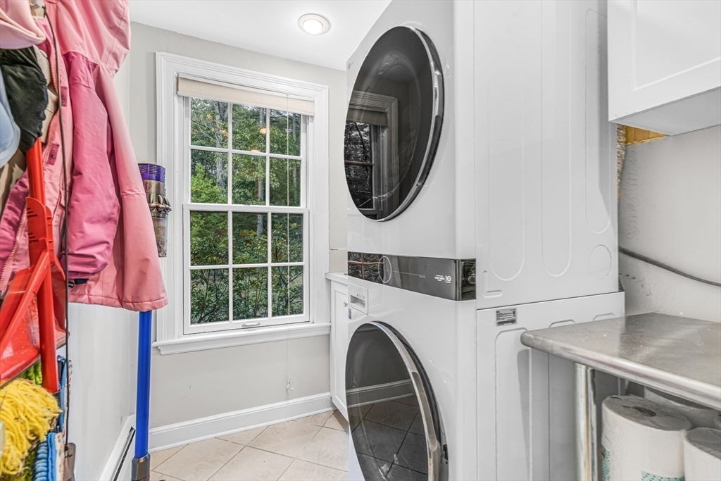 46 Round Hill Road Lincoln, MA 01773 - Photo 19 of 42 a utility room with dryer and washer