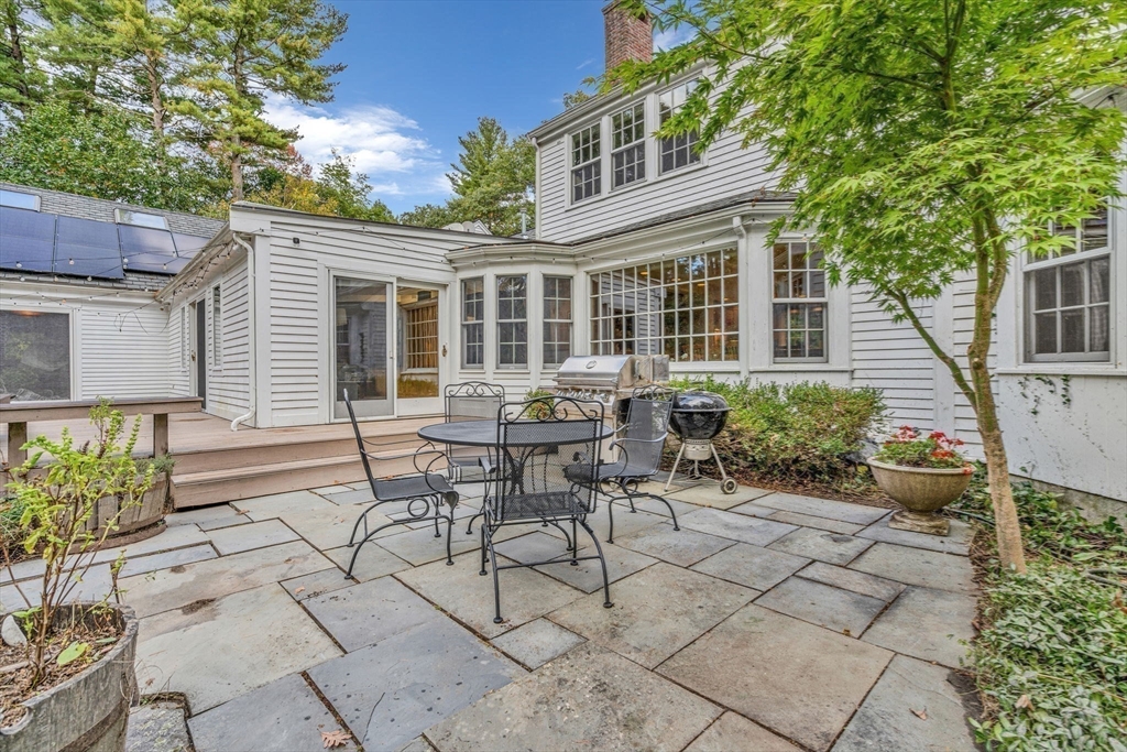 46 Round Hill Road Lincoln, MA 01773 - Photo 31 of 42 a view of a house with backyard and sitting area