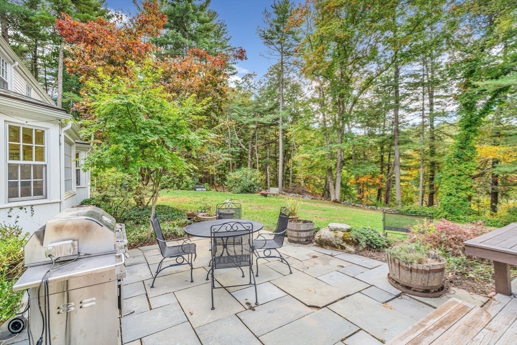 46 Round Hill Road Lincoln, MA 01773 - Photo 32 of 42 a view of a patio with garden and furniture