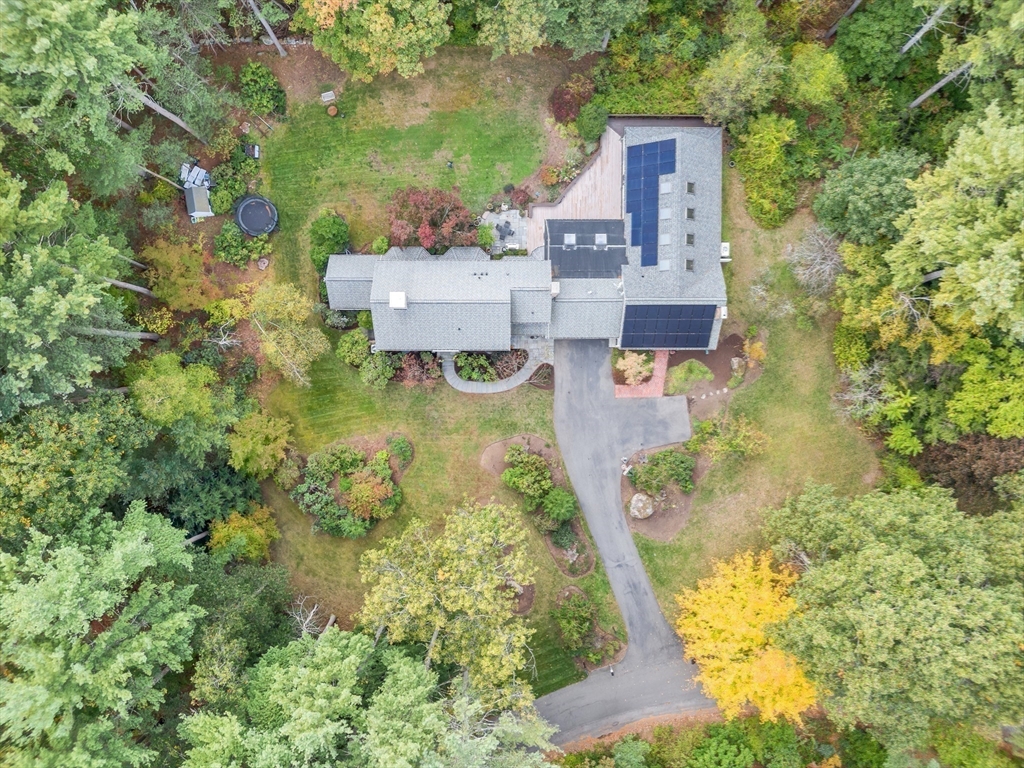 46 Round Hill Road Lincoln, MA 01773 - Photo 37 of 42 an aerial view of residential house with outdoor space and trees all around