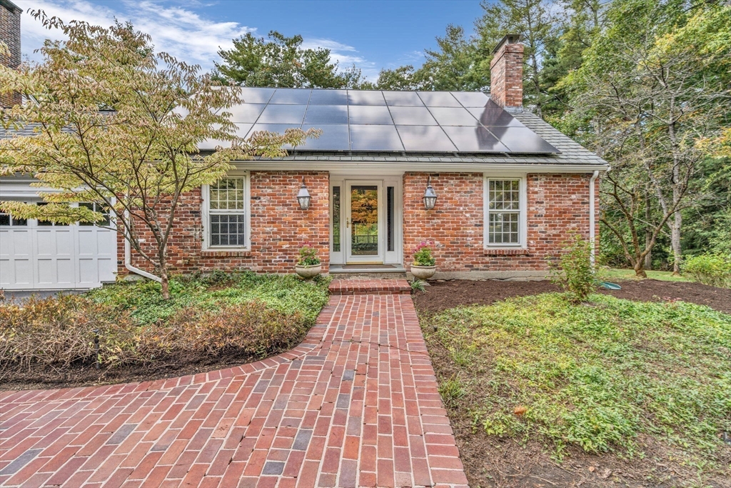 46 Round Hill Road Lincoln, MA 01773 - Photo 4 of 42 a front view of a house with yard