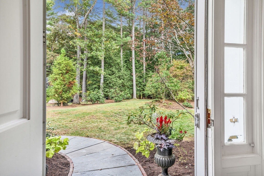 46 Round Hill Road Lincoln, MA 01773 - Photo 5 of 42 a view of a garden with potted plants