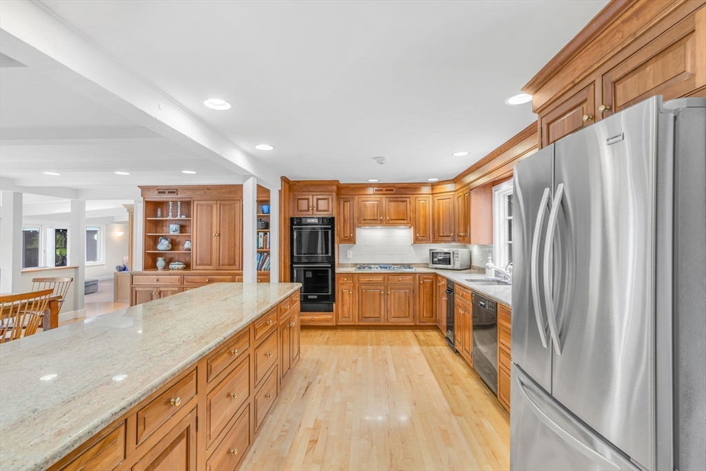 46 Round Hill Road Lincoln, MA 01773 - Photo 8 of 42 a large white kitchen with a large window