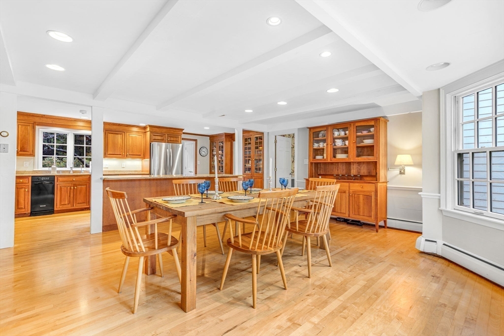 46 Round Hill Road Lincoln, MA 01773 - Photo 10 of 42 a view of a dining room with furniture and a kitchen