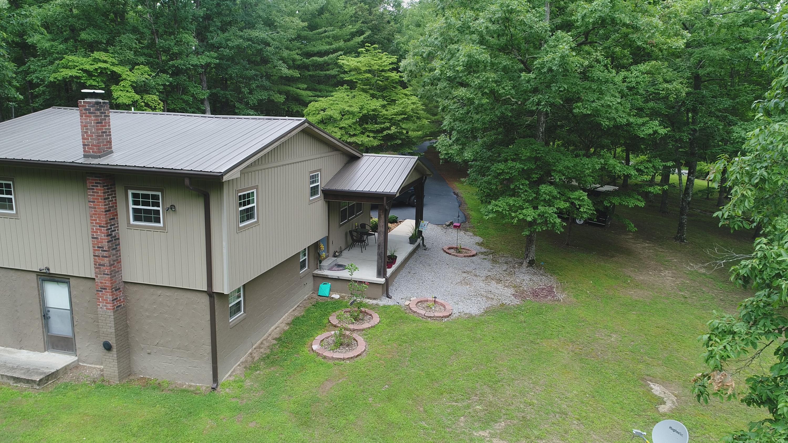 405 Milo Webb Road Crossville, TN 38572 - Photo 3 of 39 Left Front