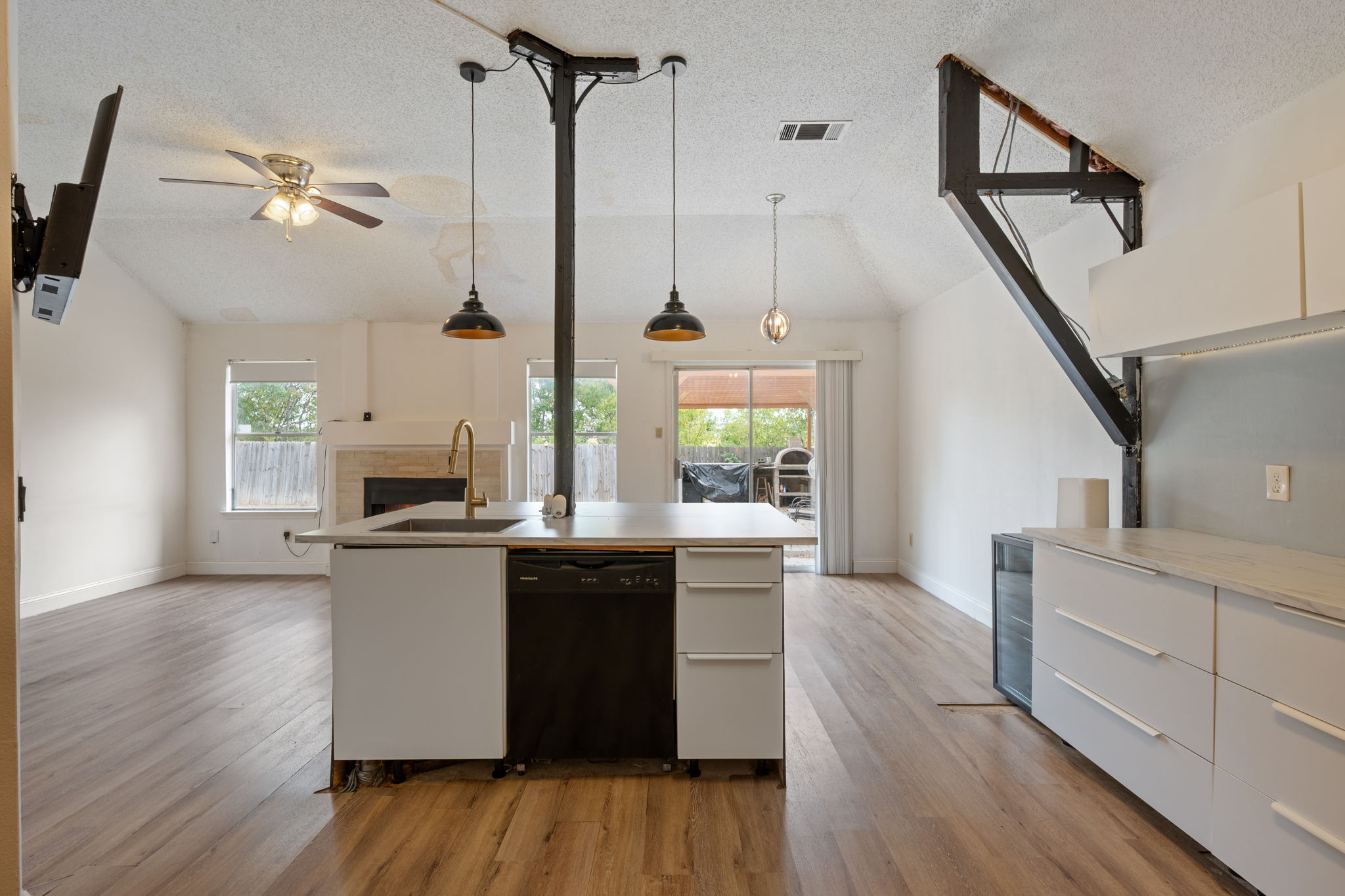 12501 Fallen Tower Lane Austin, TX 78753 - Photo 12 of 31 a kitchen with appliances cabinets and wooden floor