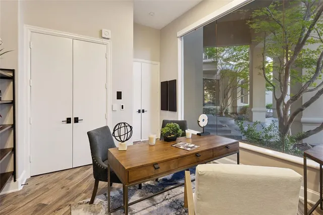 a view of a dining room with furniture window and outside view