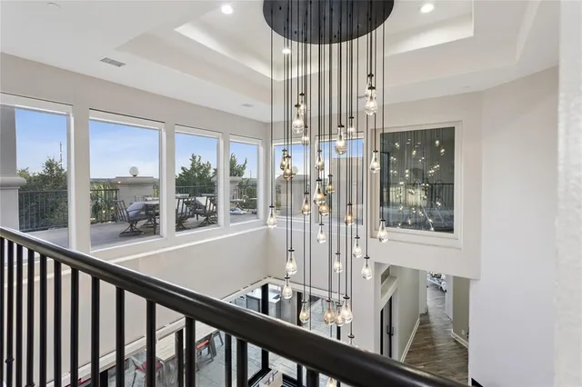 a view of a porch with a floor to ceiling window