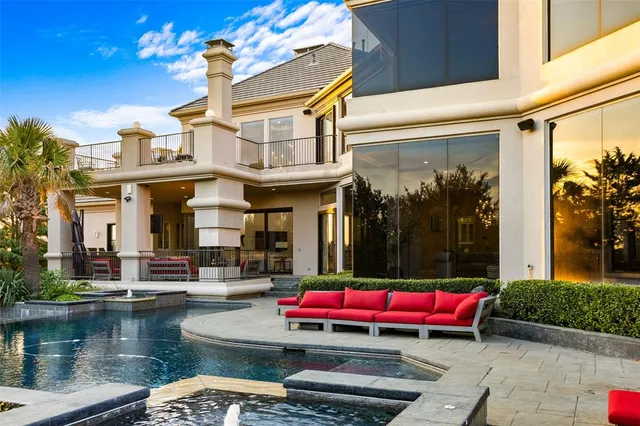 a house view with a sitting space and wooden floor