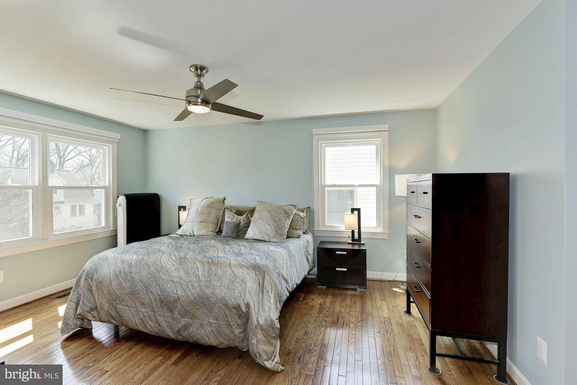 1304 19th Road South Arlington, VA 22202 - Photo 15 of 25 a bedroom with a bed and wooden floor