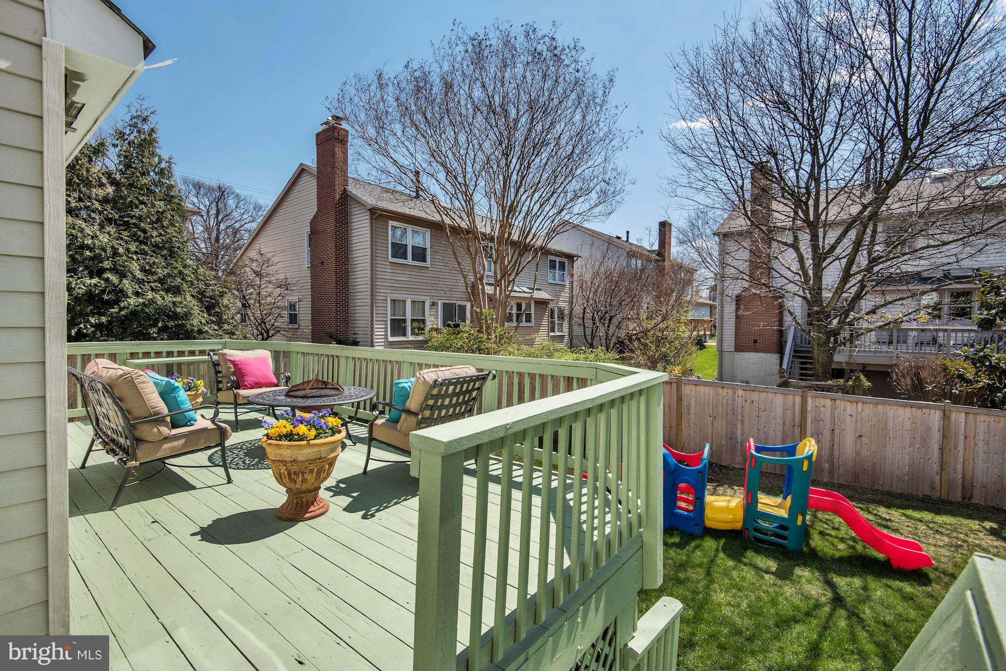 1304 19th Road South Arlington, VA 22202 - Photo 21 of 25 a view of deck with furniture and trees