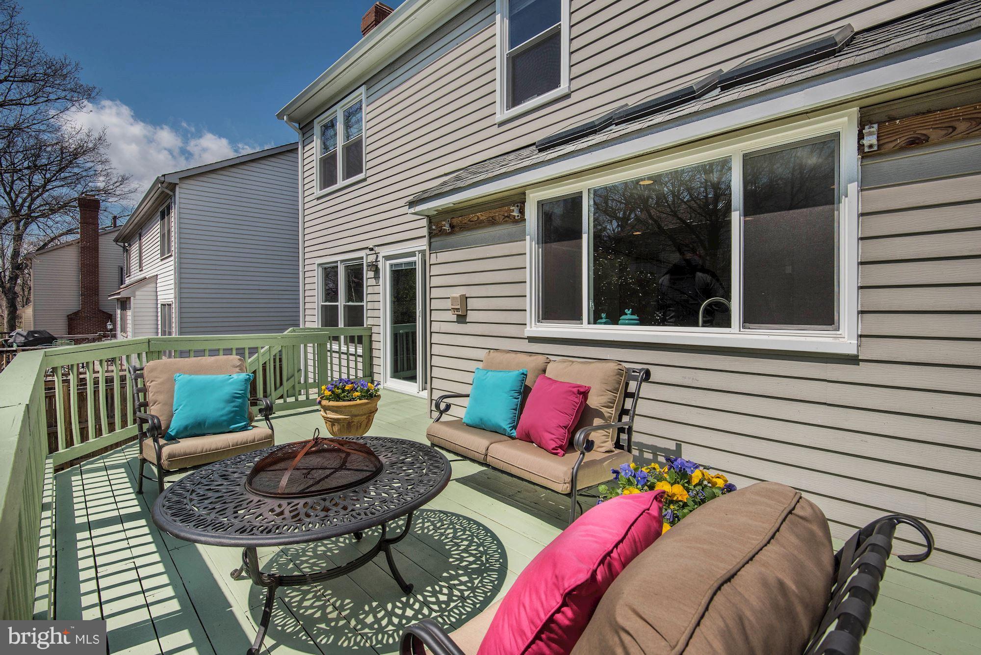 1304 19th Road South Arlington, VA 22202 - Photo 23 of 25 a view of a patio with couches chairs and a potted plant