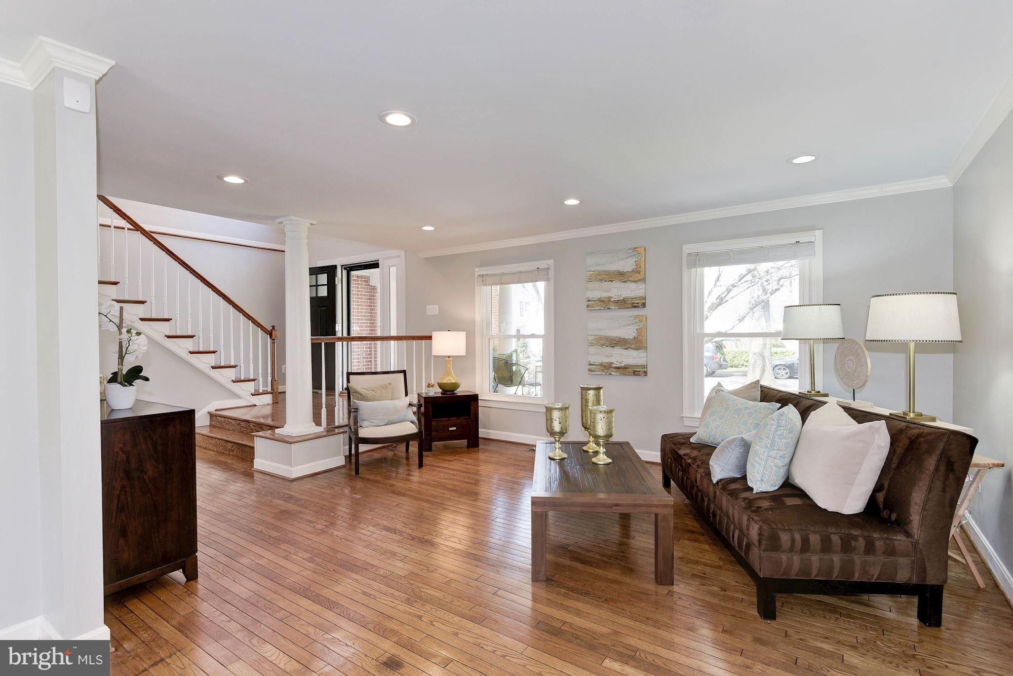 1304 19th Road South Arlington, VA 22202 - Photo 4 of 25 a living room with furniture and wooden floor