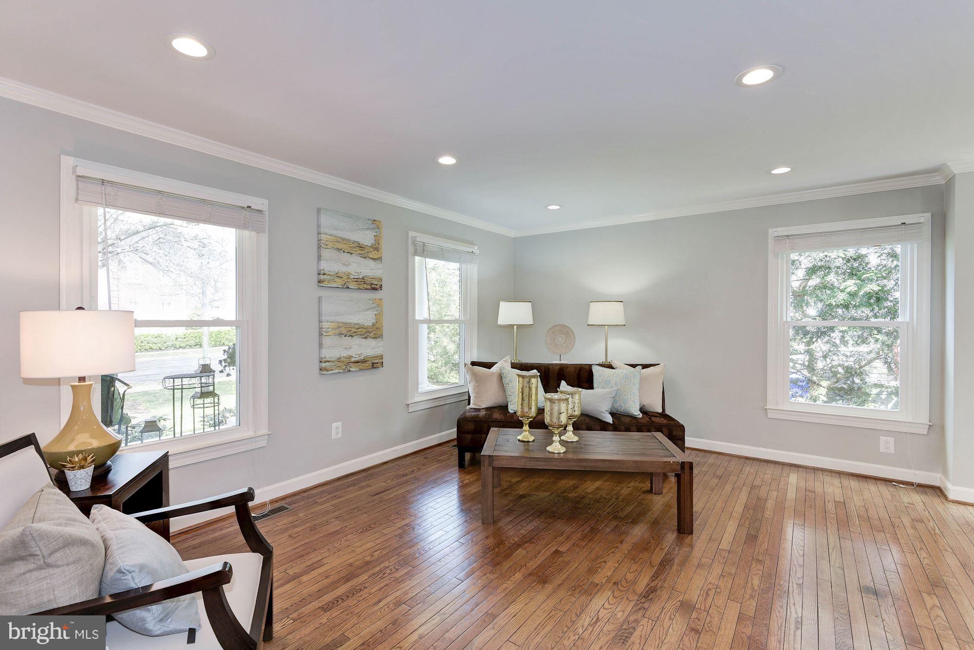 1304 19th Road South Arlington, VA 22202 - Photo 5 of 25 a living room with furniture and a window