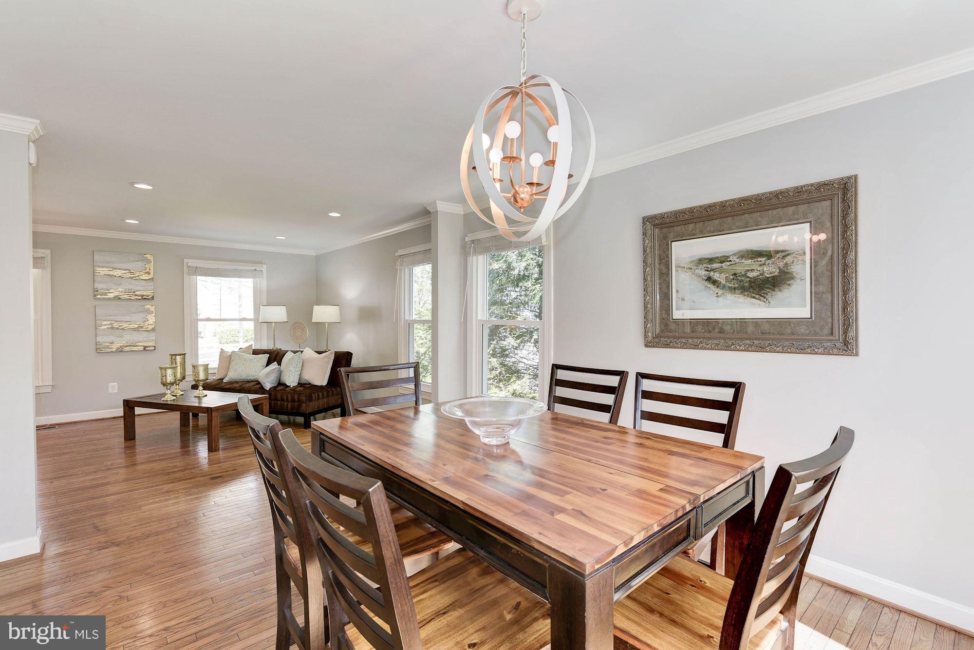 1304 19th Road South Arlington, VA 22202 - Photo 6 of 25 a view of a dining room with furniture and wooden floor