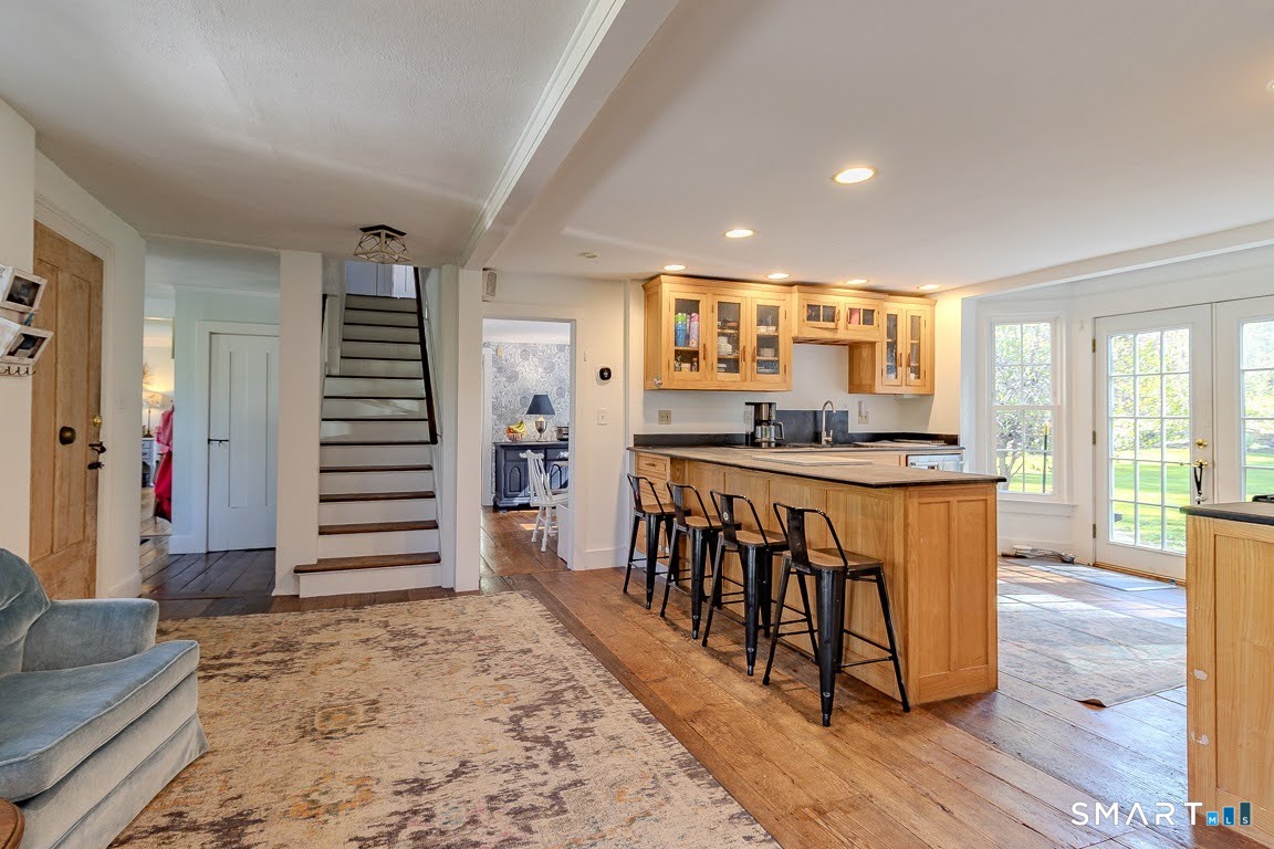 700 Watertown Road Middlebury, CT 06762 - Photo 8 of 39 Family room and kitchen