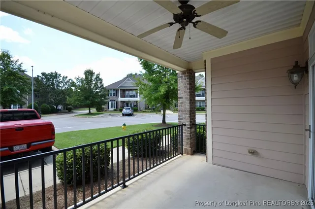 a view of livingroom with a floor to ceiling window and wooden floor