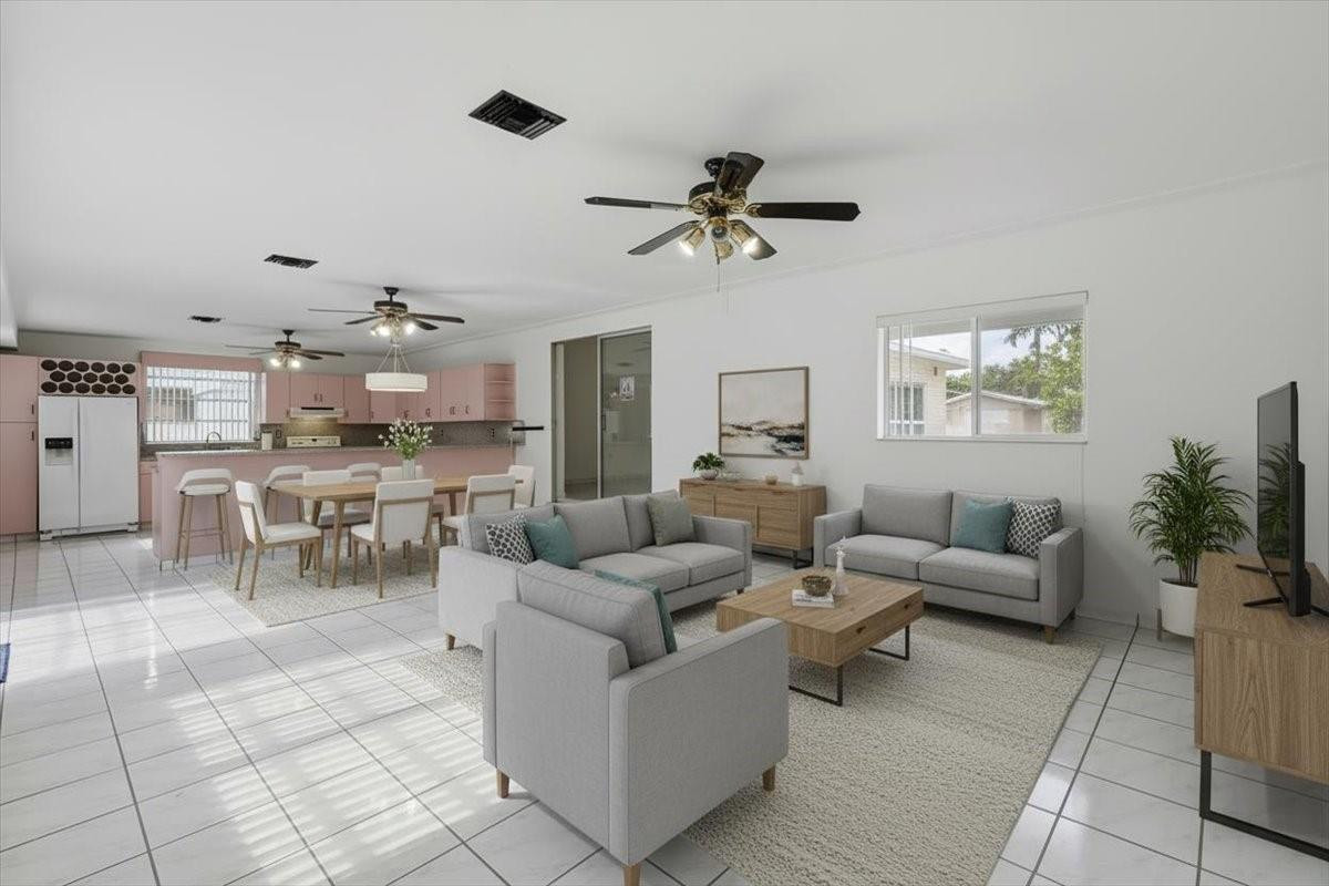 5580 Southwest 2nd Street Miami, FL 33134 - Photo 16 of 29 a living room with furniture and a large window