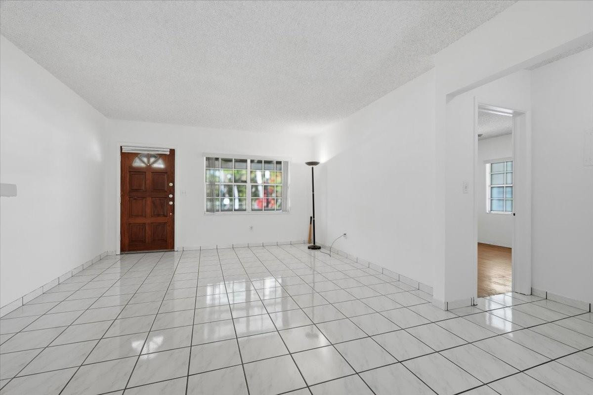 5580 Southwest 2nd Street Miami, FL 33134 - Photo 5 of 29 a view of an empty room with window
